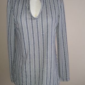 Tory Burch tunic blouse, may be worn all seasons.
